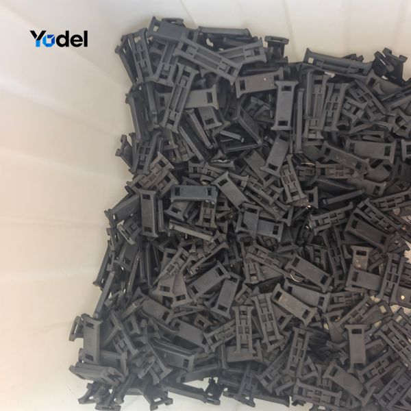 Modular 10x20 drag chain links and mounting bracket accessories ready for installation