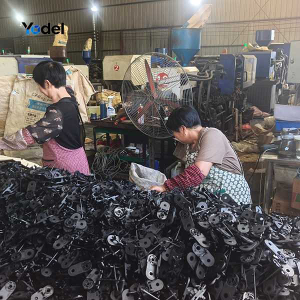 Drag chain 15x30 component manufacturing and manual part sorting process in workshop