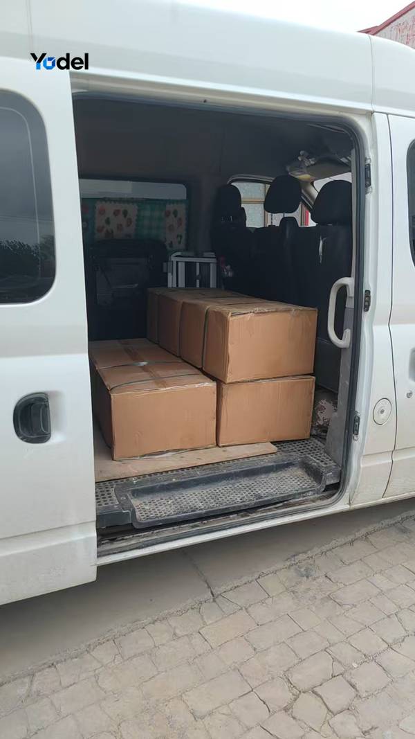 Packaged drag chain 18x37 cartons loaded inside delivery van for shipping and customer dispatch