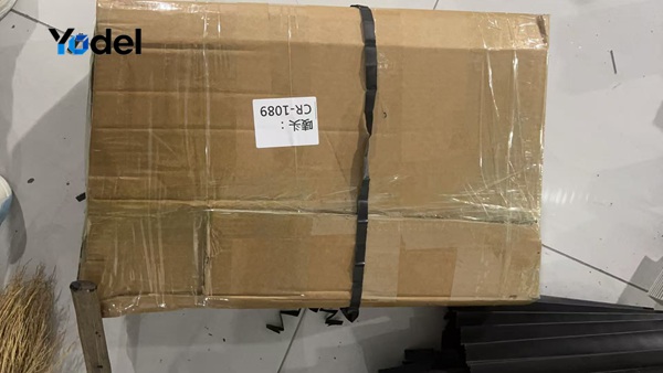 Sealed corrugated carton package containing plastic drag chain carriers ready for shipping