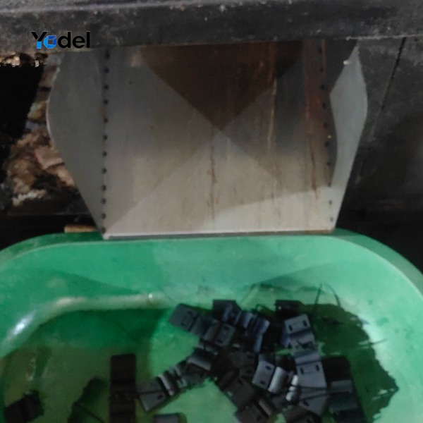Precision injection molding of PA66 nylon plastic cable drag chain 30x103 components in green collection bin