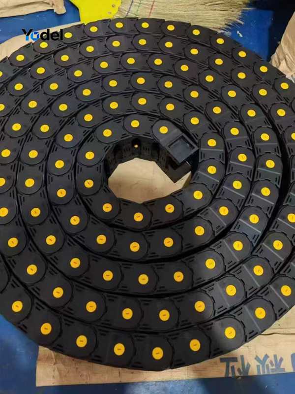 Fully assembled heavy duty 80x200 CNC cable track coiled and ready for machine installation