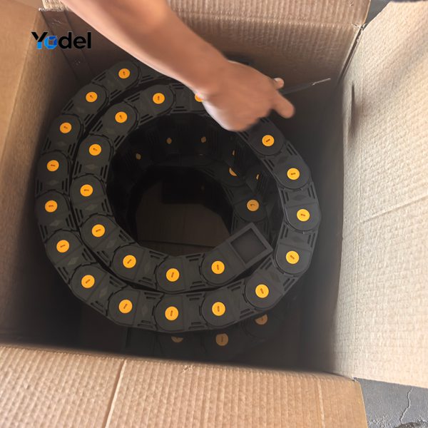 Secure carton packaging of 35x150 bridge openable cnc drag chain ready for export shipment