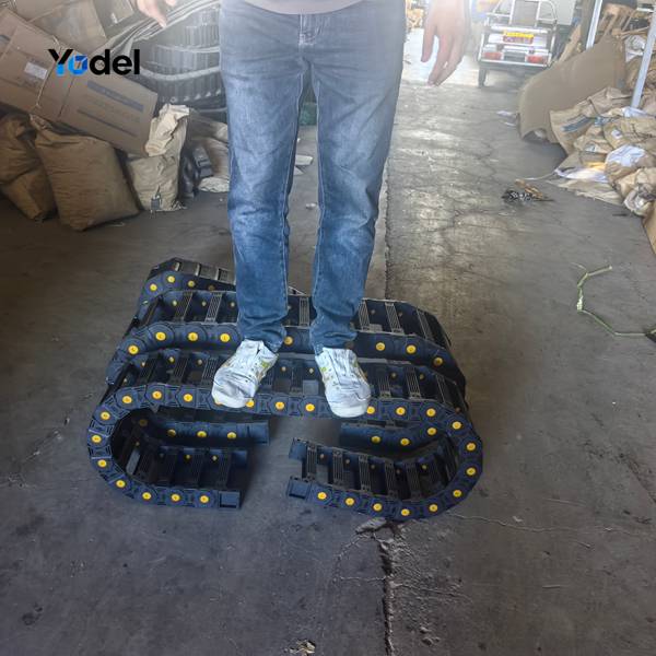 Rigorous human weight bearing and flexibility test on 30% glass fiber reinforced cnc drag chain