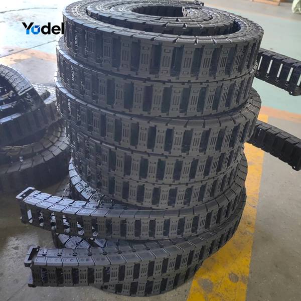 Reinforced export cartons containing 25x77 silent cable carriers packed on pallets by China drag chain manufacturer