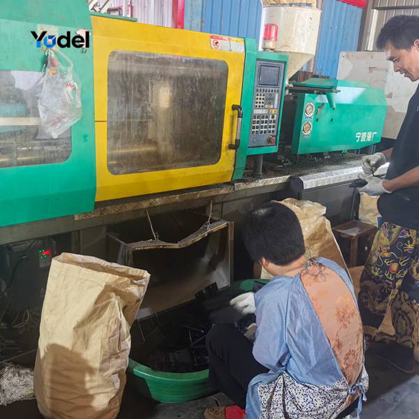 Precision injection molding machine producing PA66 silent drag chain links in factory