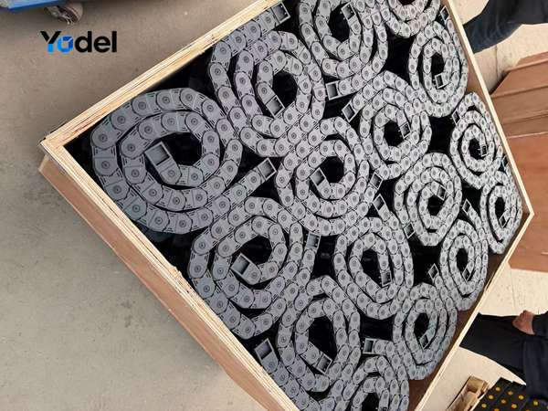 YDLDW25103 flexible cable carrier 25x103 neatly arranged in export wooden crates for shipping